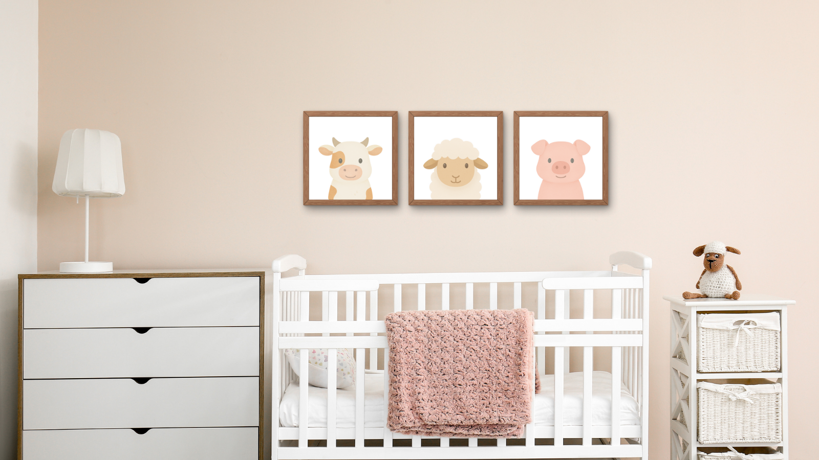 Nursery room with white crib, dresser, and framed prints of farm animals.