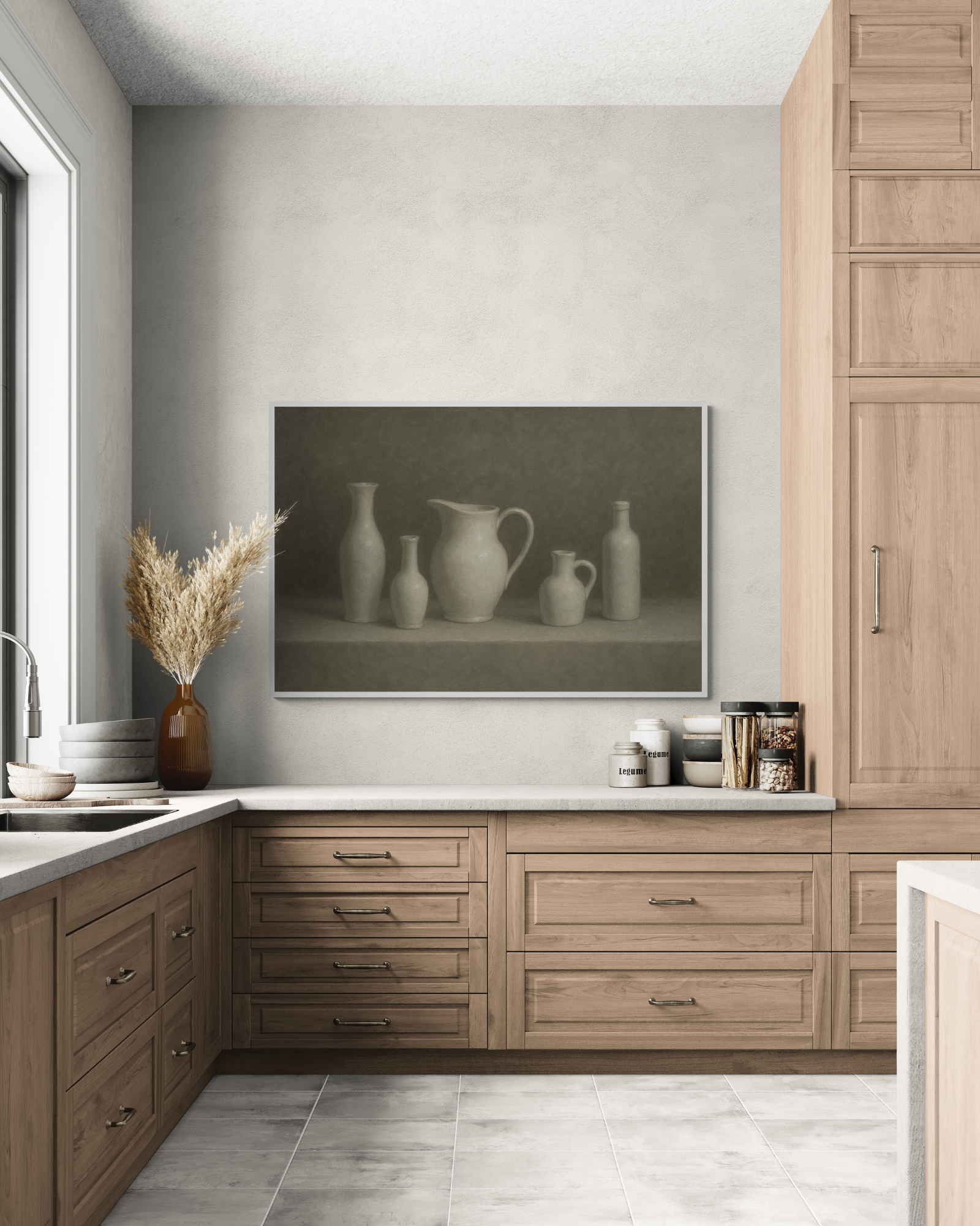 Modern kitchen with wooden cabinets, a neutral color scheme, and a framed print of vases and jugs in gray tones on the wall.